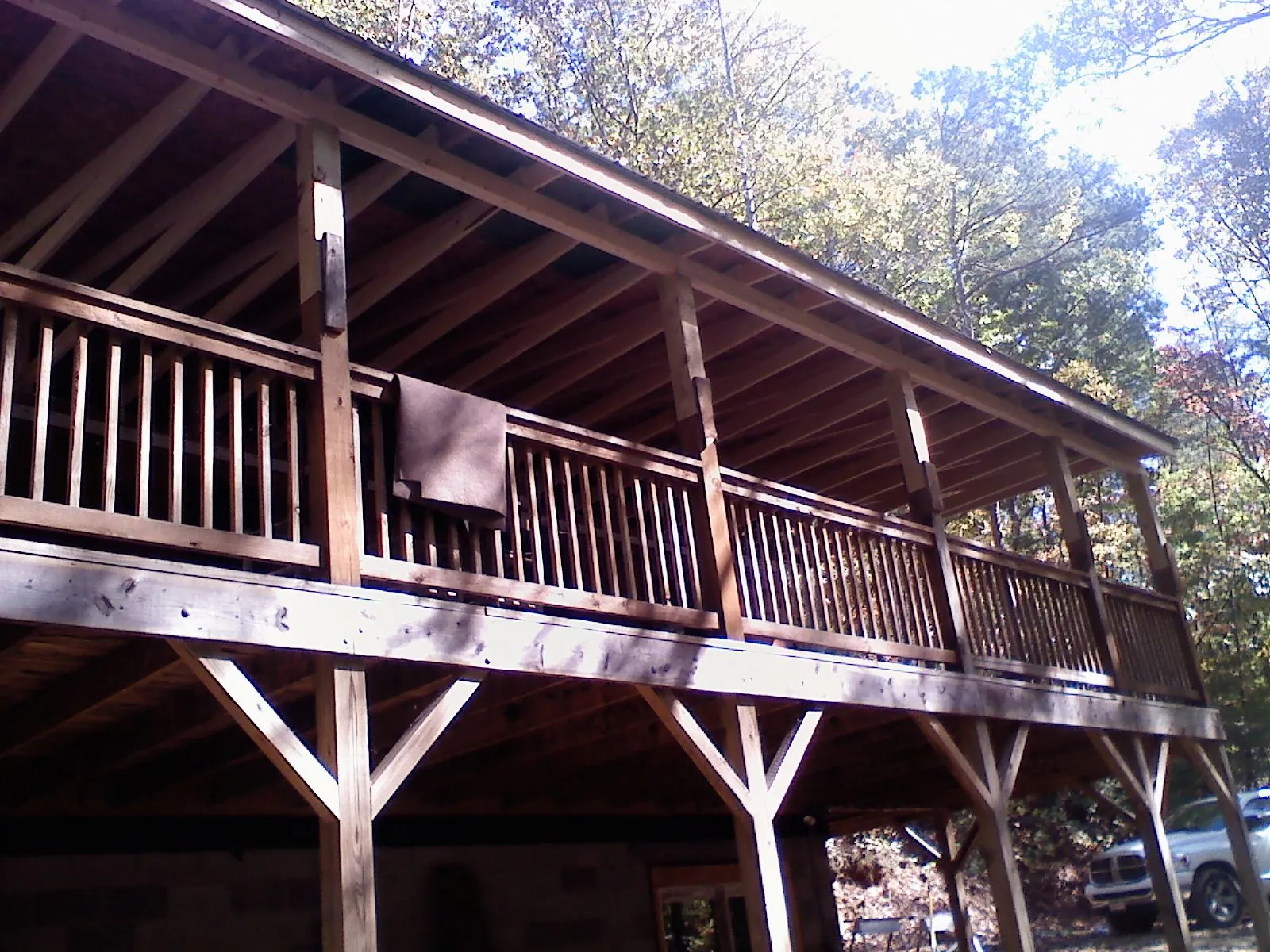 Timber framing under a new elevated porch and deck — Roof Leak Repair in Germanton by Roofing Brothers